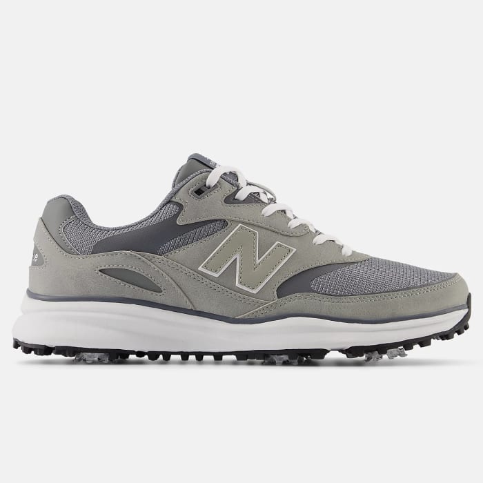 Side view of grey and white New Balance golf shoes.